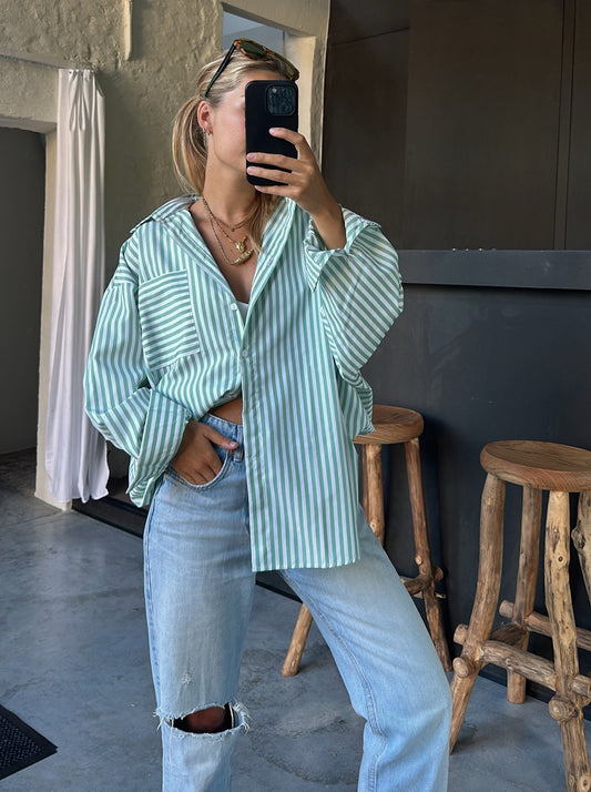 Green-striped blouse